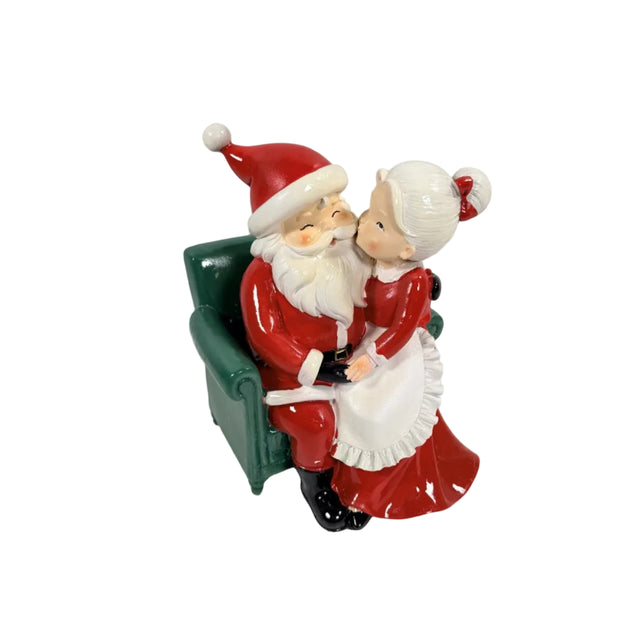 Mr And Mrs Claus Sitting In A Chair 15x17x20cm