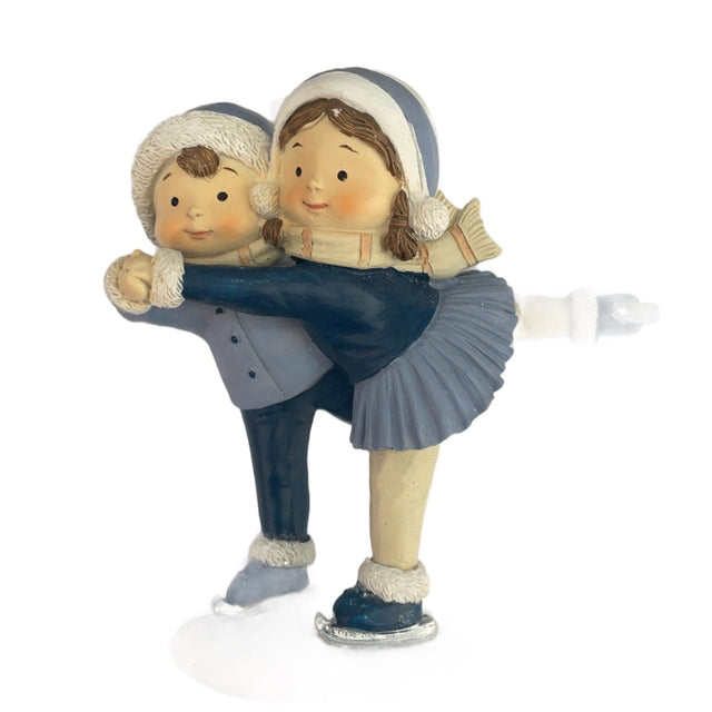 Boy and girl skating polyresin 8x14,5x16cm