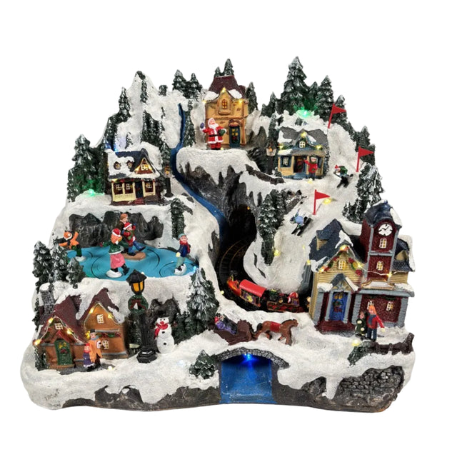 LED scenery with church & kids skating with train 40.5x28.5x31cm