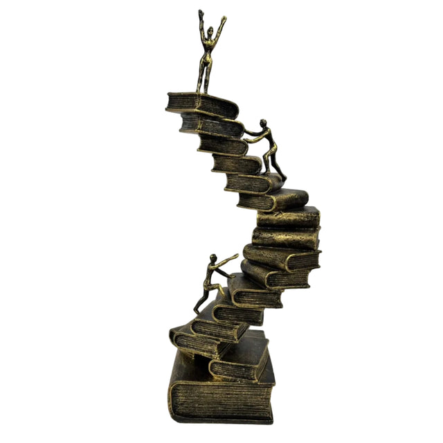 Statue abstract figure climbing a ladder of books 11.5x38cm - gold