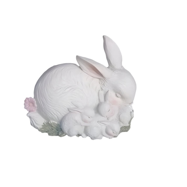 Mom and baby bunnies sleeping